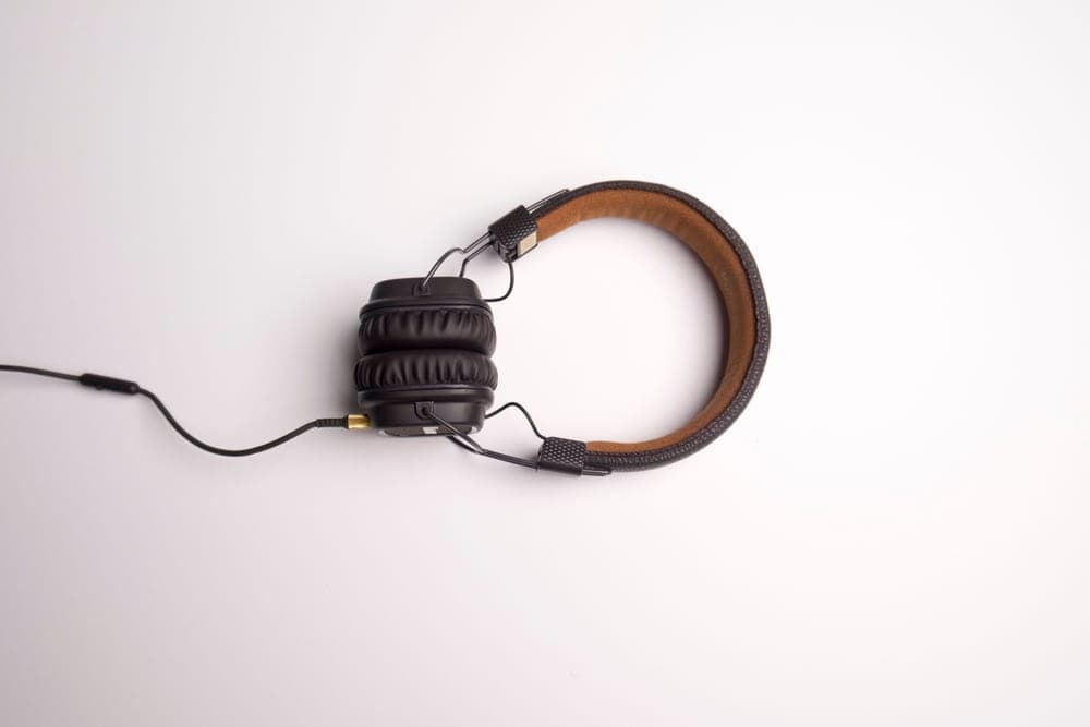Soft headphone band photographed on a pale surface - illustrative category image