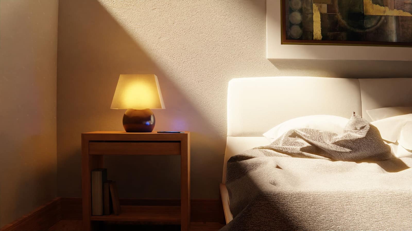 Glowing bedside lamp on a nightstand in a dim bedroom at dawn
