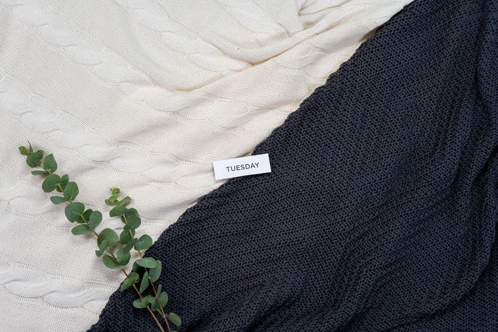 Heavy knitted textile folded in soft natural light